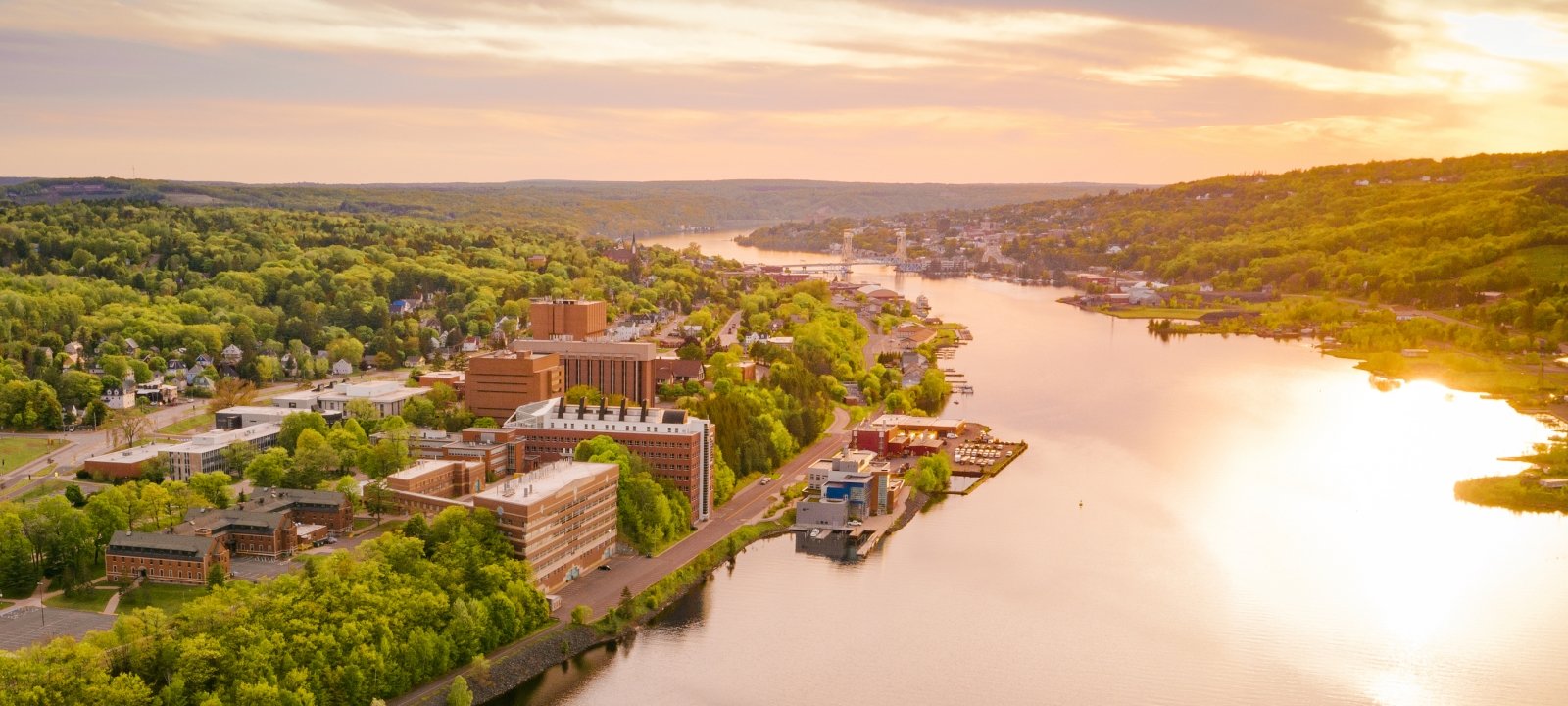 Aerial view of Michigan Tech and Portage Canal in the evening.