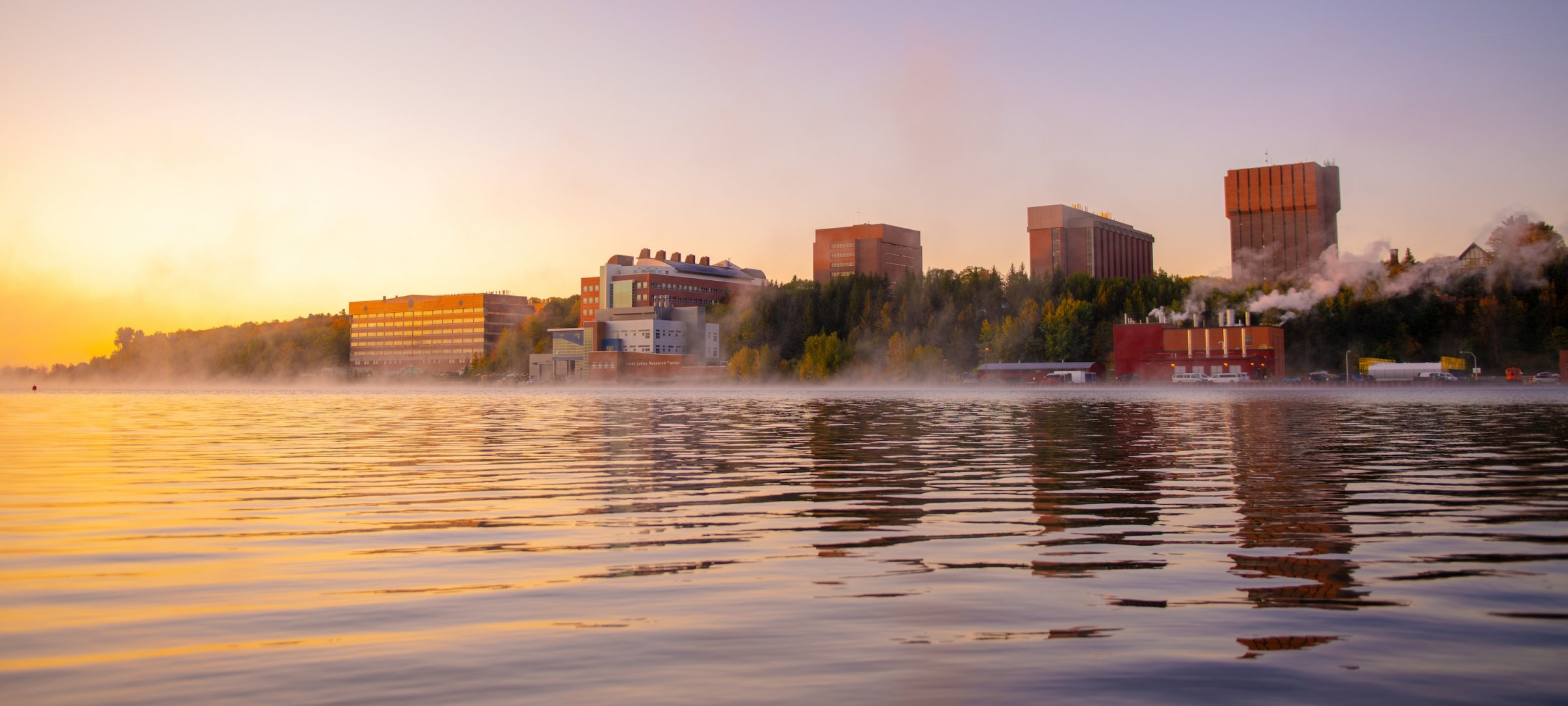 View of campus from the Portage Canal on a misty morning.