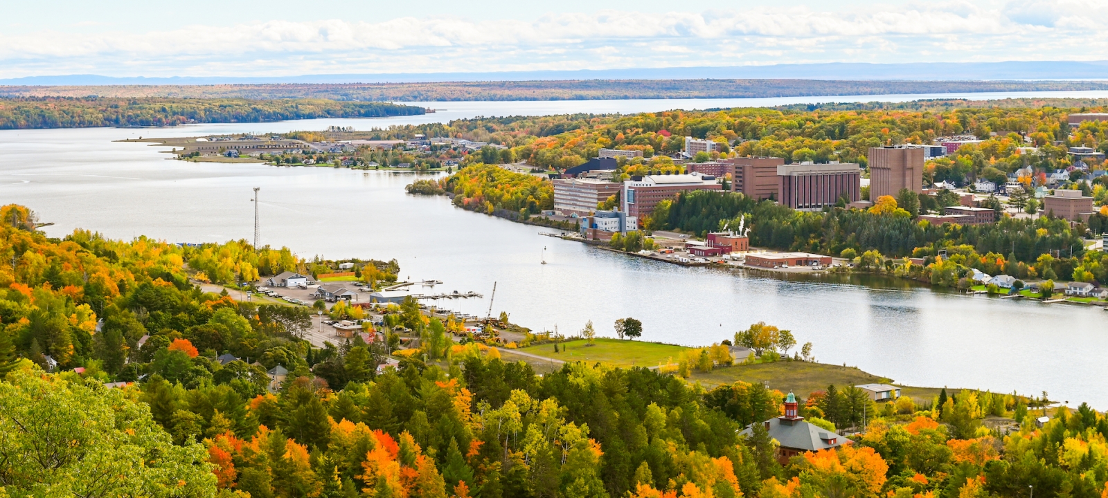 View of Michigan Tech campus and Portage Canal from Mont Ripley in autumn.