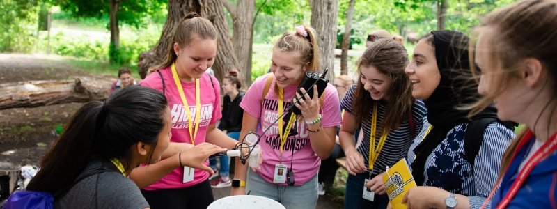 Young women participate in engineering experiments during the Summer Youth Program.