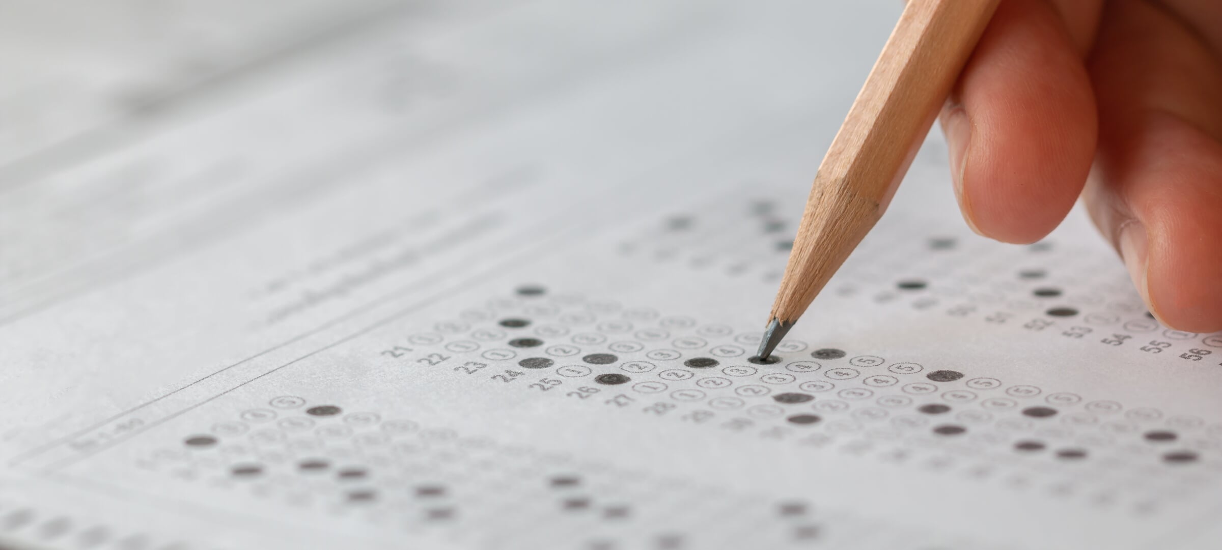 A pencil filling out a bubble test.