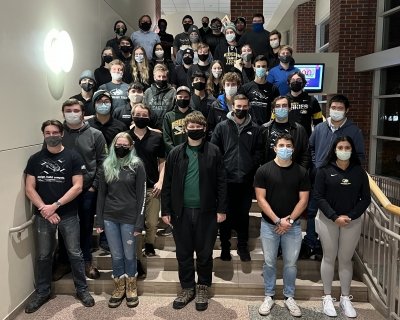 Robotic Systems team photo standing on starirs in multiple rows