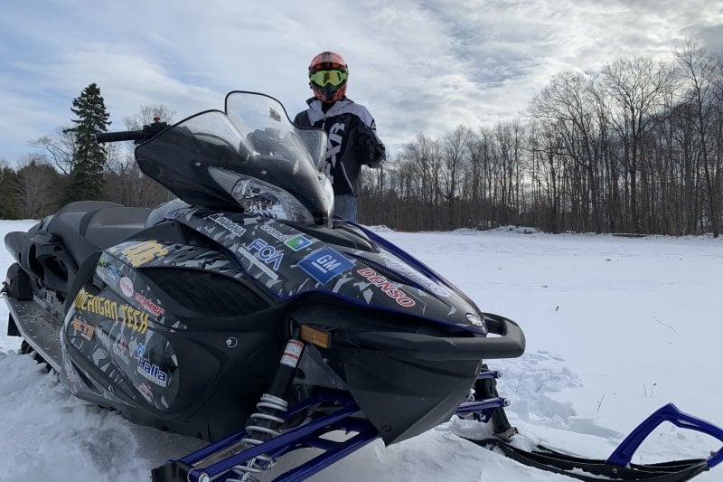 Clean snowmobile in the snow