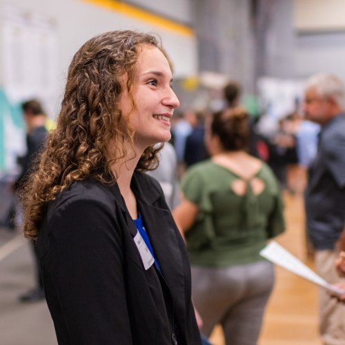 Student speaking with an employer at Career Fair