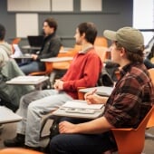 Students sitting in desks in a classroom