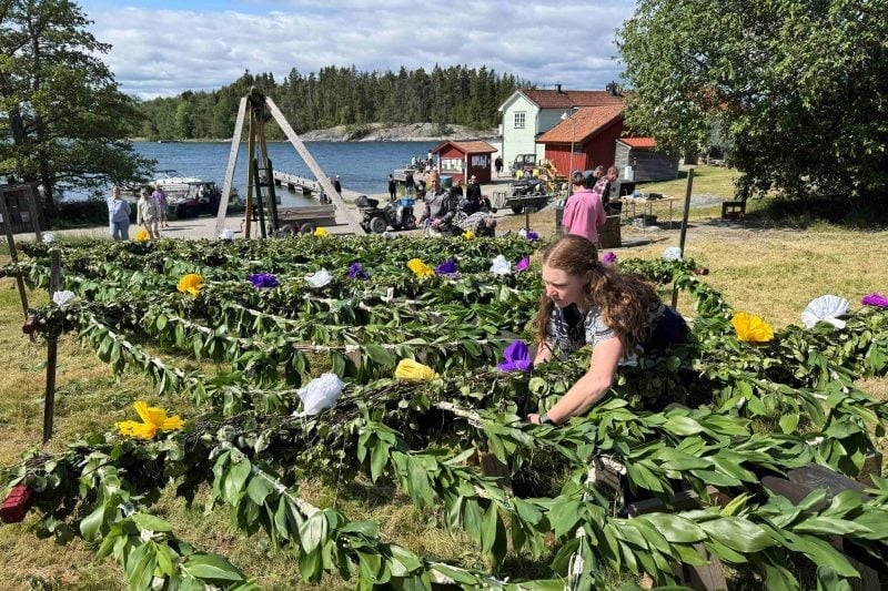 student working in a garden in Sweden