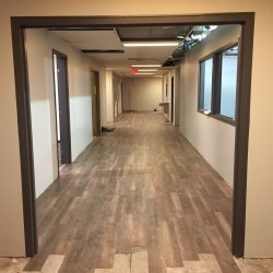 Admin Garden Level Remodel - During Pic - hallway flooring