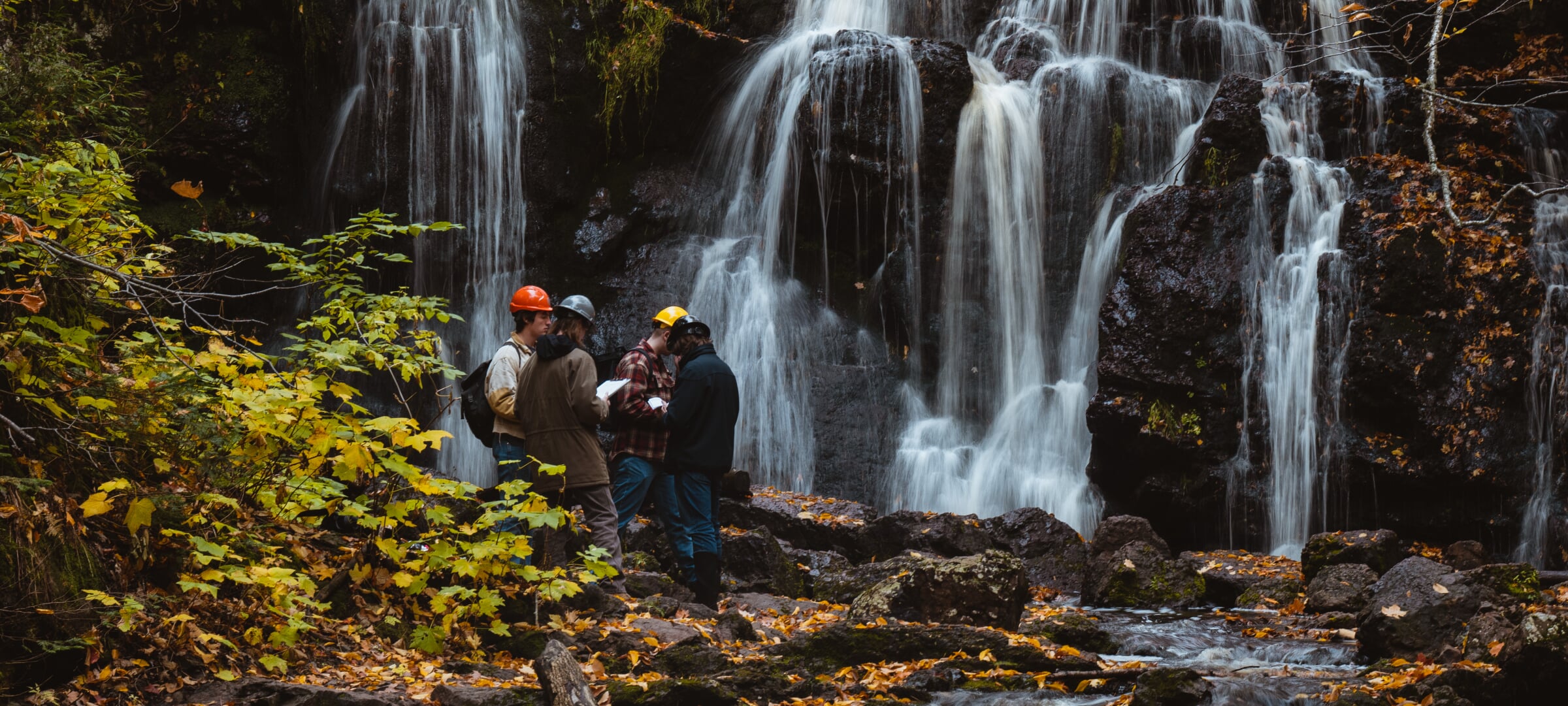 A group of students with a clipboard at Hungarian falls