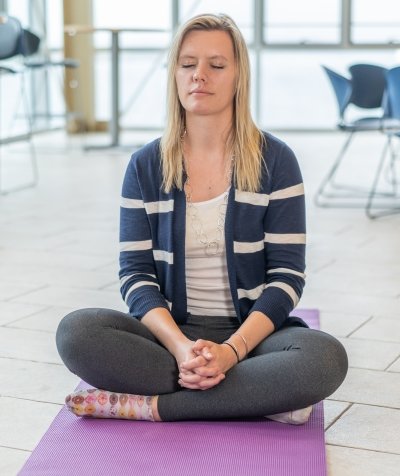 Student meditating in the GLRC