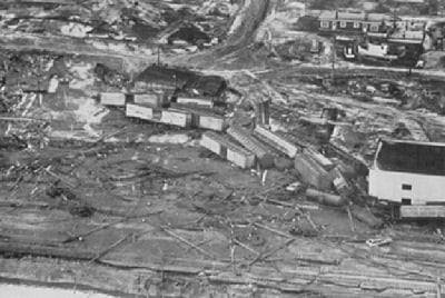 Chaotic scene in a railroad yard.