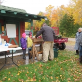 Kids watching apple pressing