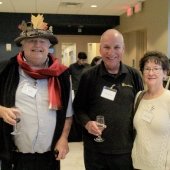 Bill Rose stands with David and Martha Adler