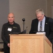 David Adler and John Gierke at podium