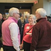 Three attendees talking