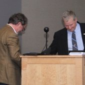 Todd Stone and John Gierke shaking hands