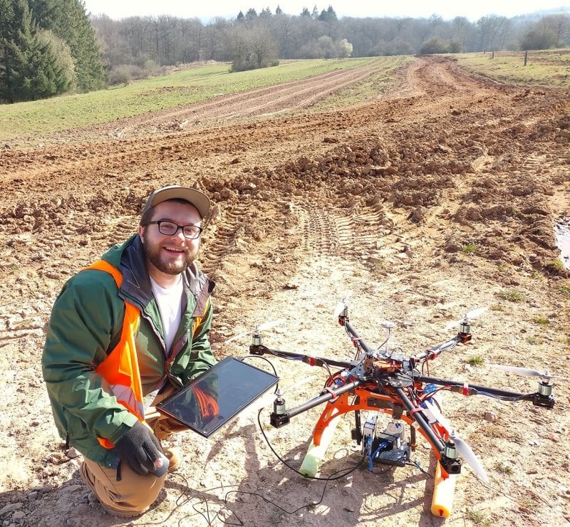 Geological and Mining Engineering student researcher with drone.
