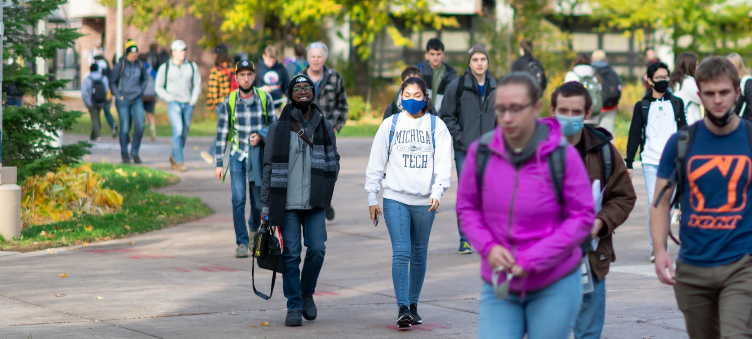 Collage image of students walking through campus