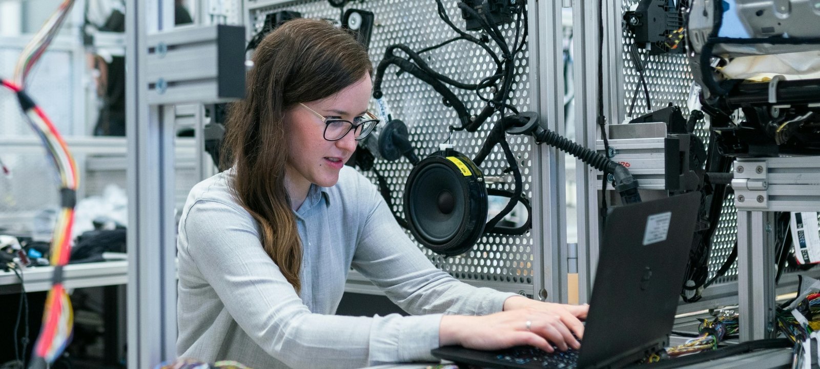 Female professional working on an online course while at her job.