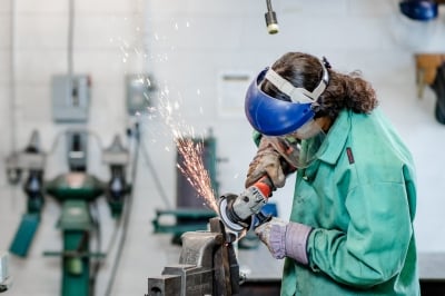 Worker in machine shop