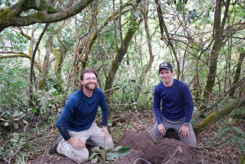 Greg Waite and Luke Bowman installing a seismometer on Fuego Volcano, Guatemala.