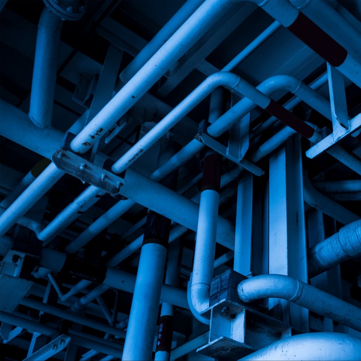 Close up of pipes in a chemical manufacturing plant