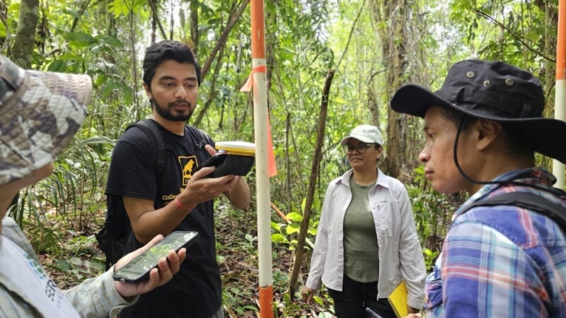Parth teaching a drone workshop class while in the forest in Suriname.