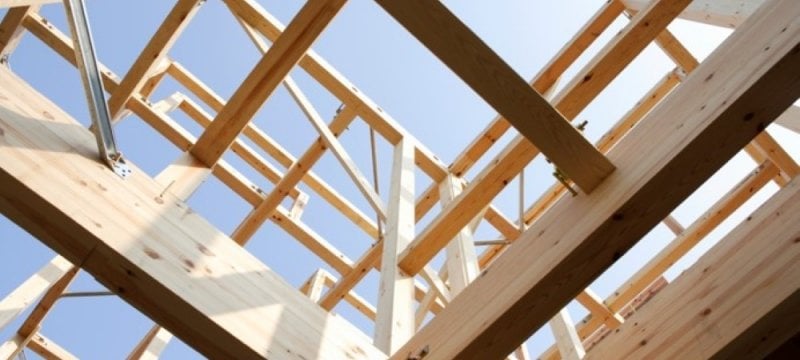 Close up of a  wooden building under construction.