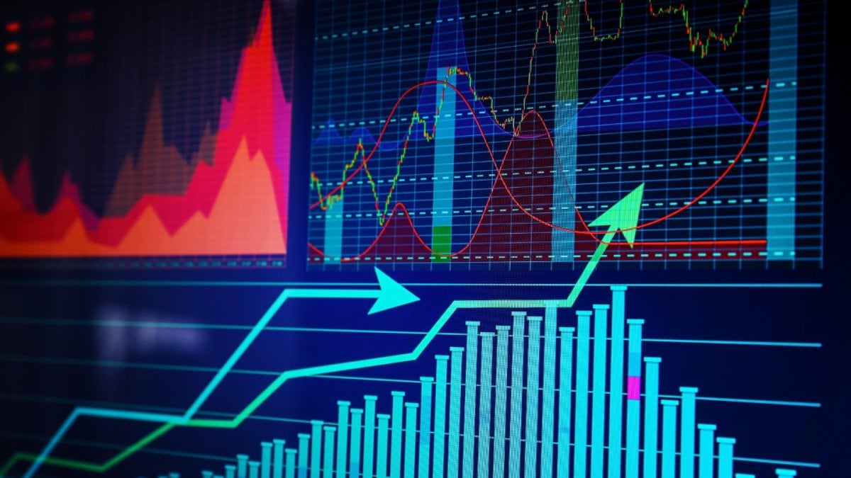 A computer screen with a bright bar chart graphic and a trend line.