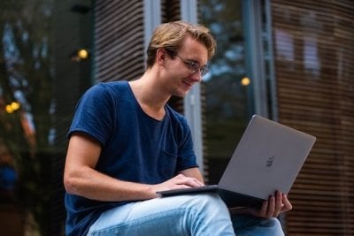 Male studying online for his engineering management degree.