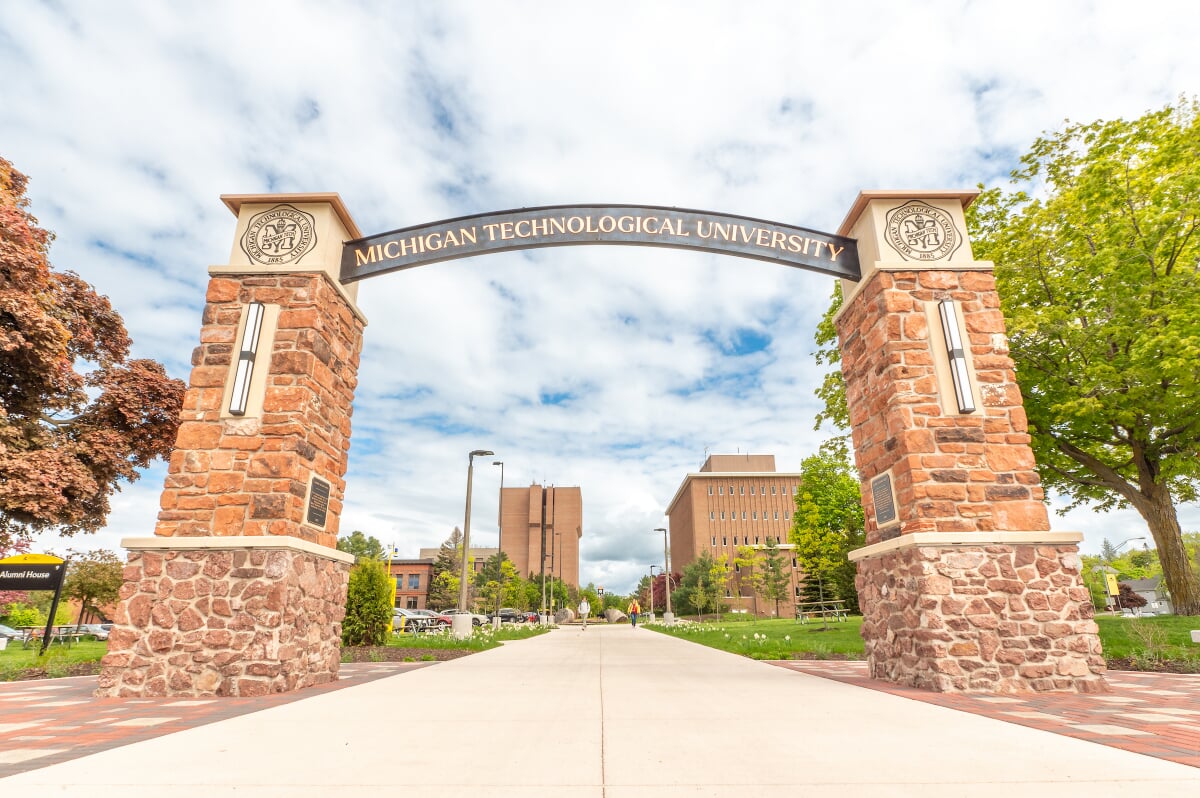 Michigan Tech archway on a sunny spring day.