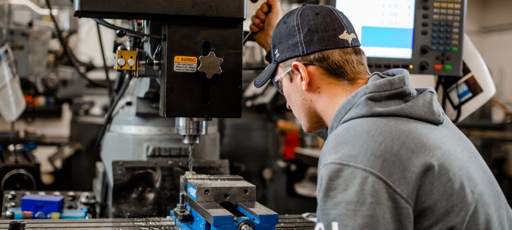 Working professional in a machine shop.