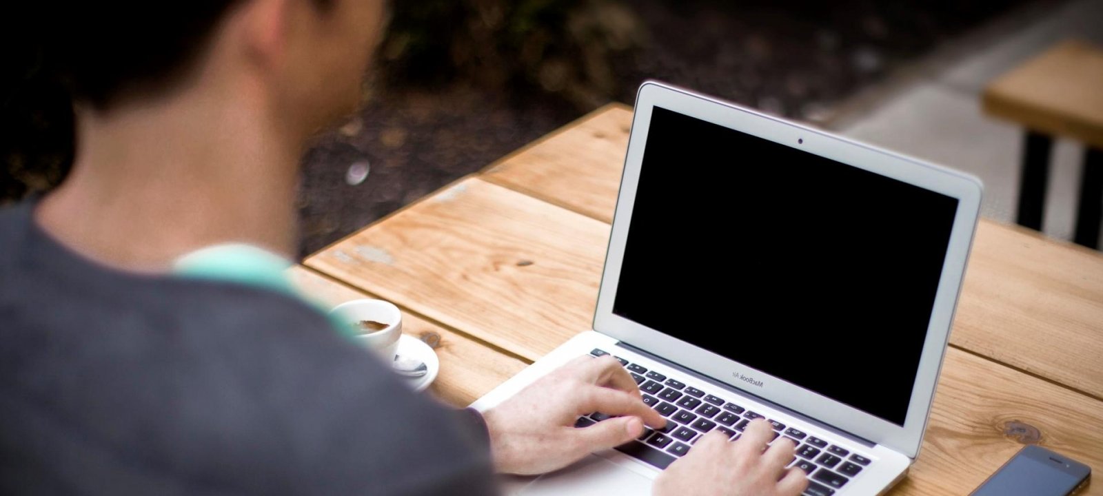 An online student working at a computer.