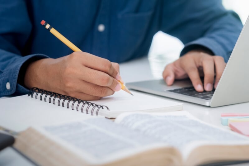 Student working at a laptop