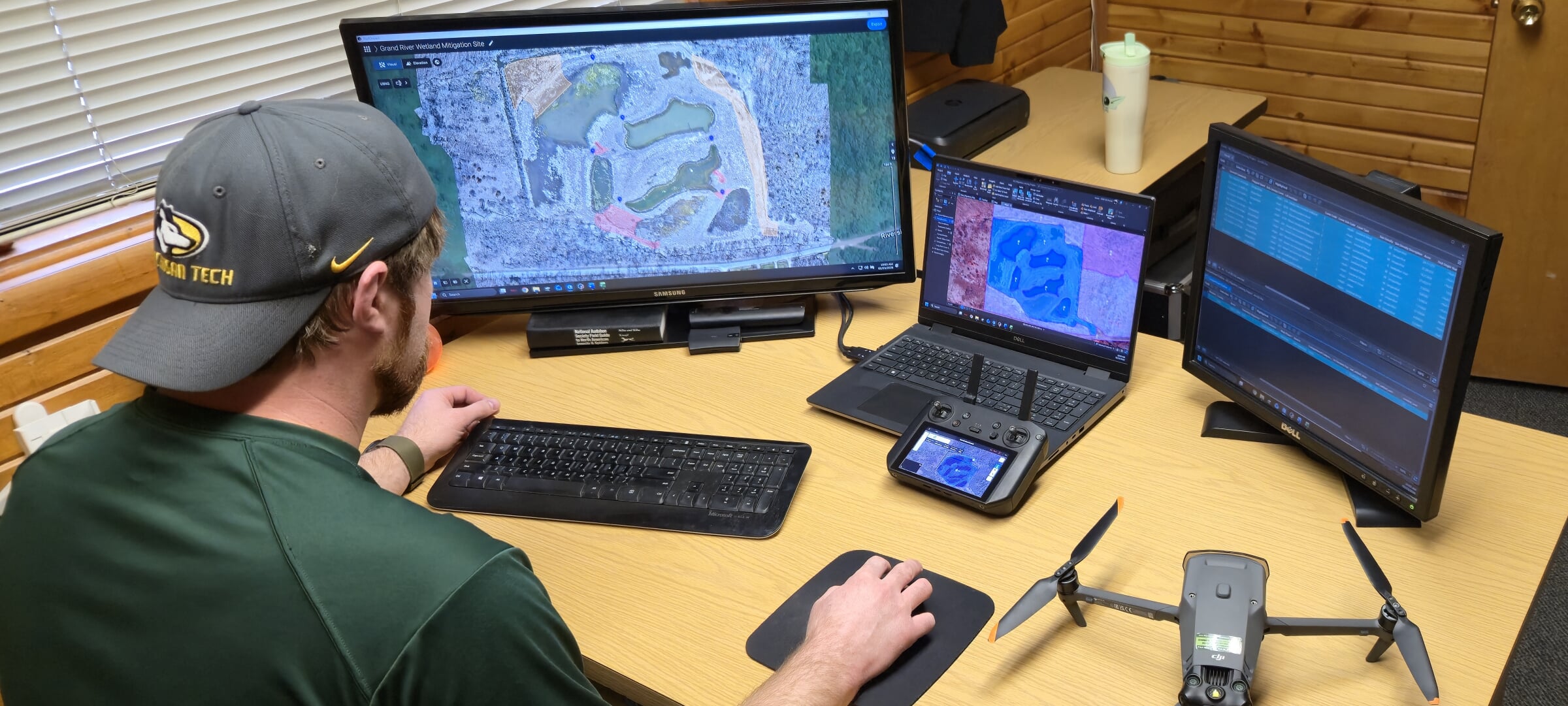 James Miller working at his desk at the Michigan DNR.