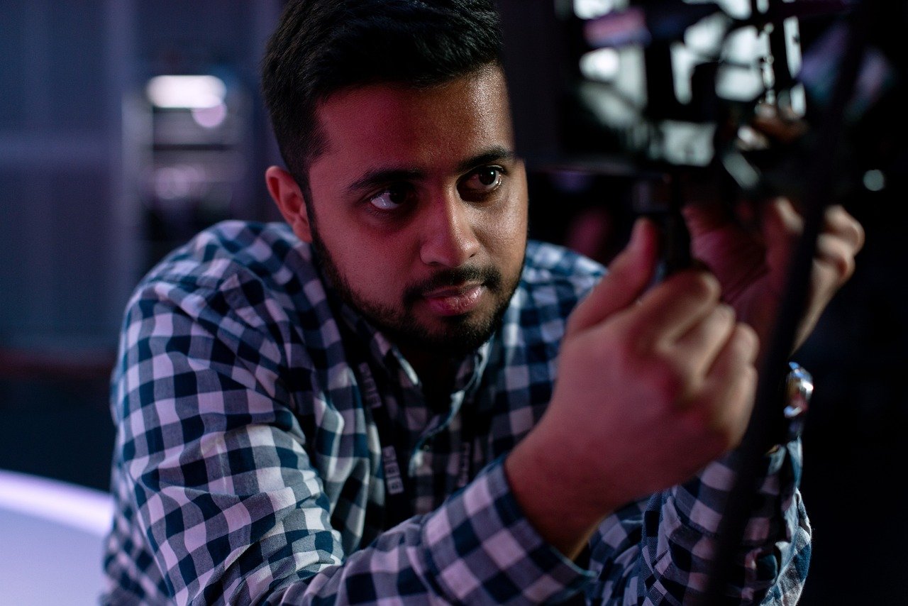 Electrical Engineer working on some wiring for a system.