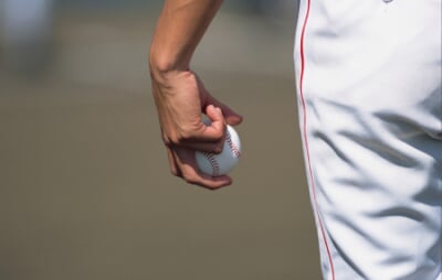 Player about to pitch a baseball.