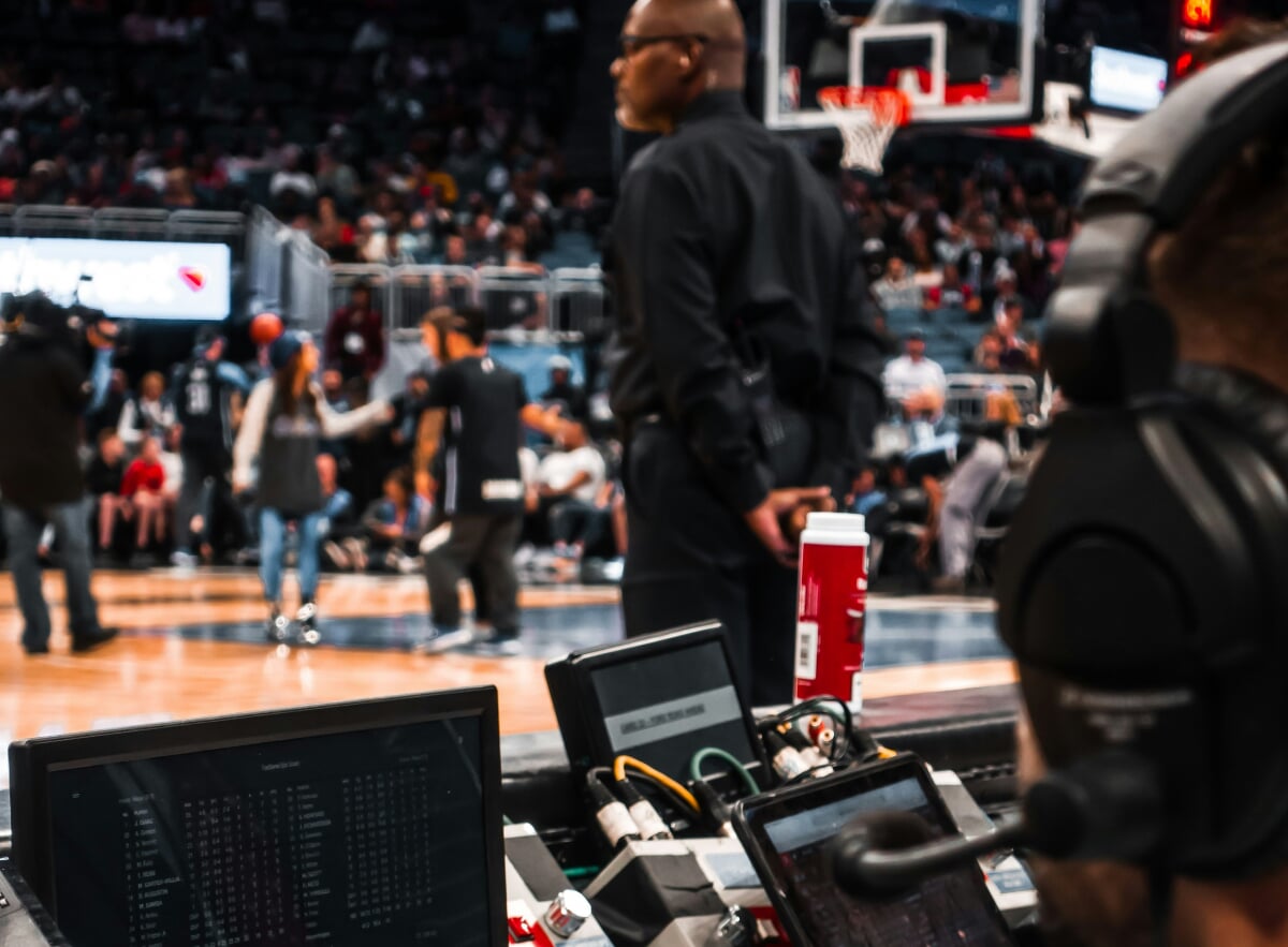 Sports Statisticians at work at an NBA game.