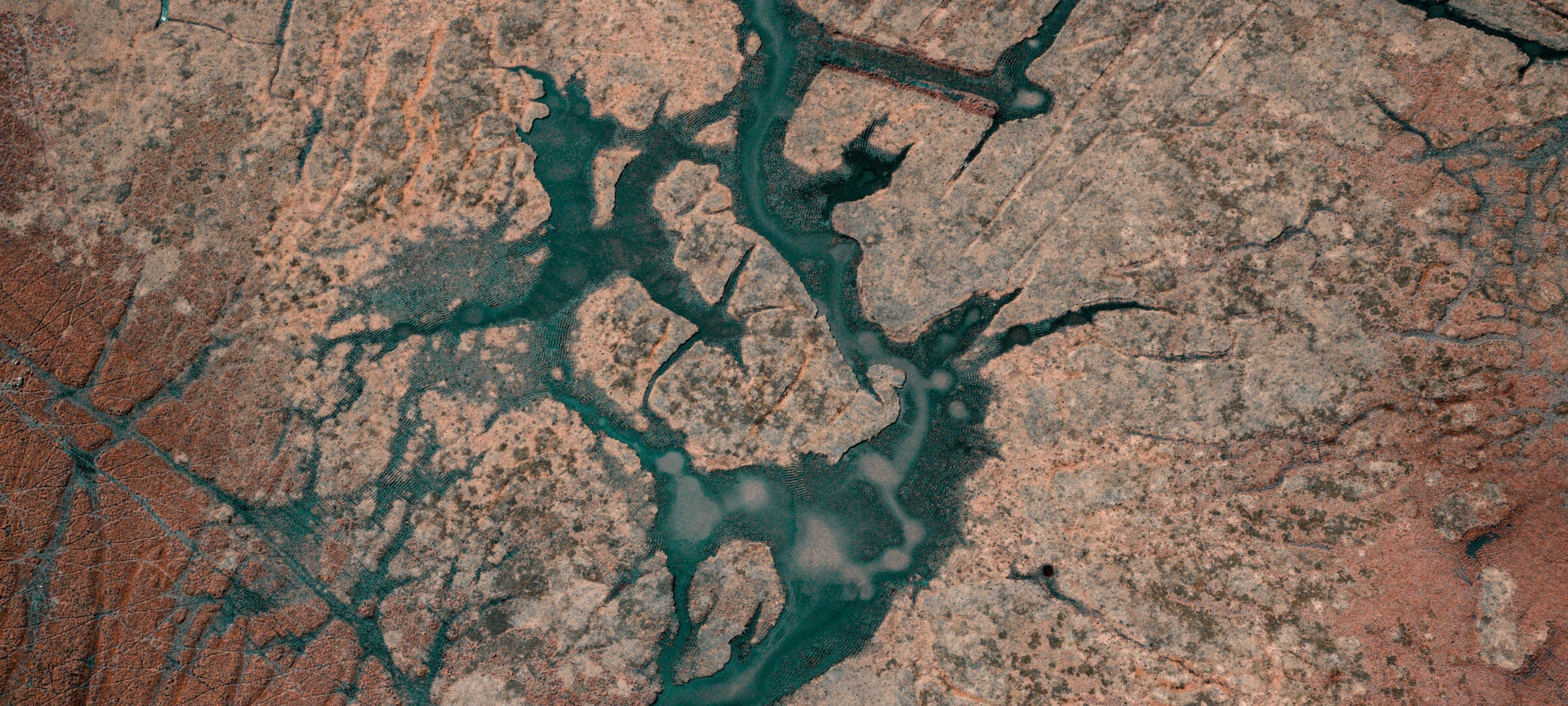 A GIS image of a complex river and tributaries running through a land mass.