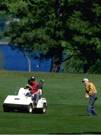 Men's league golfers golfing.