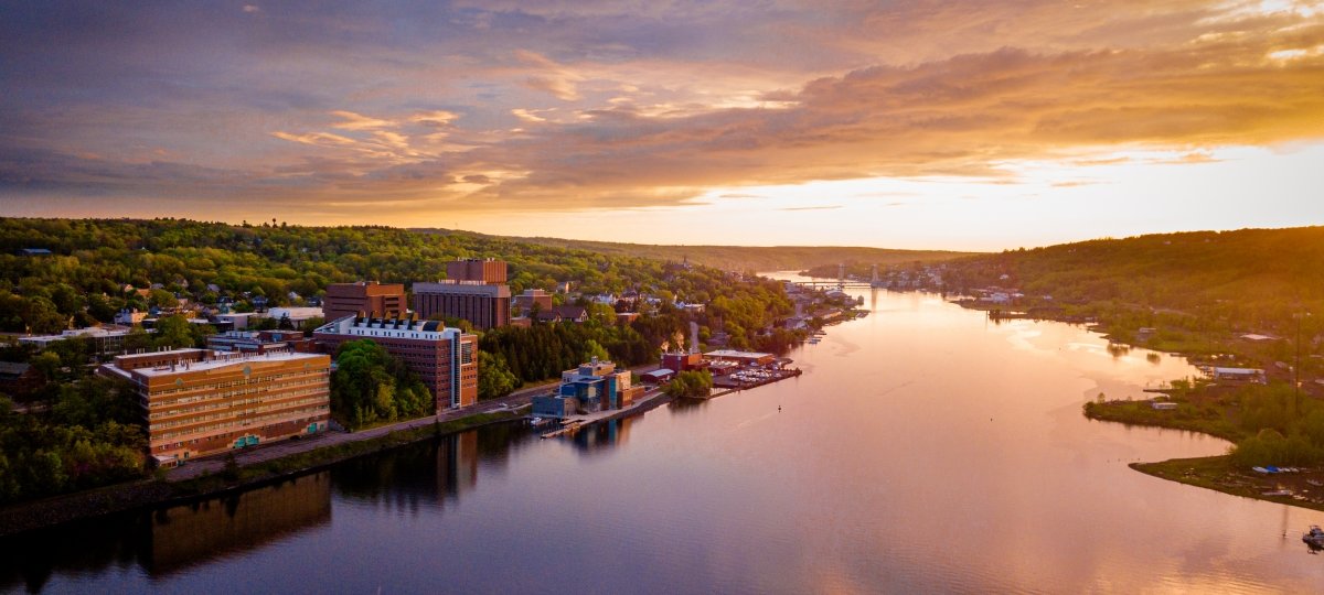 Aerial view of Michigan Tech campus, Portage Canal, and Lift Bridge.