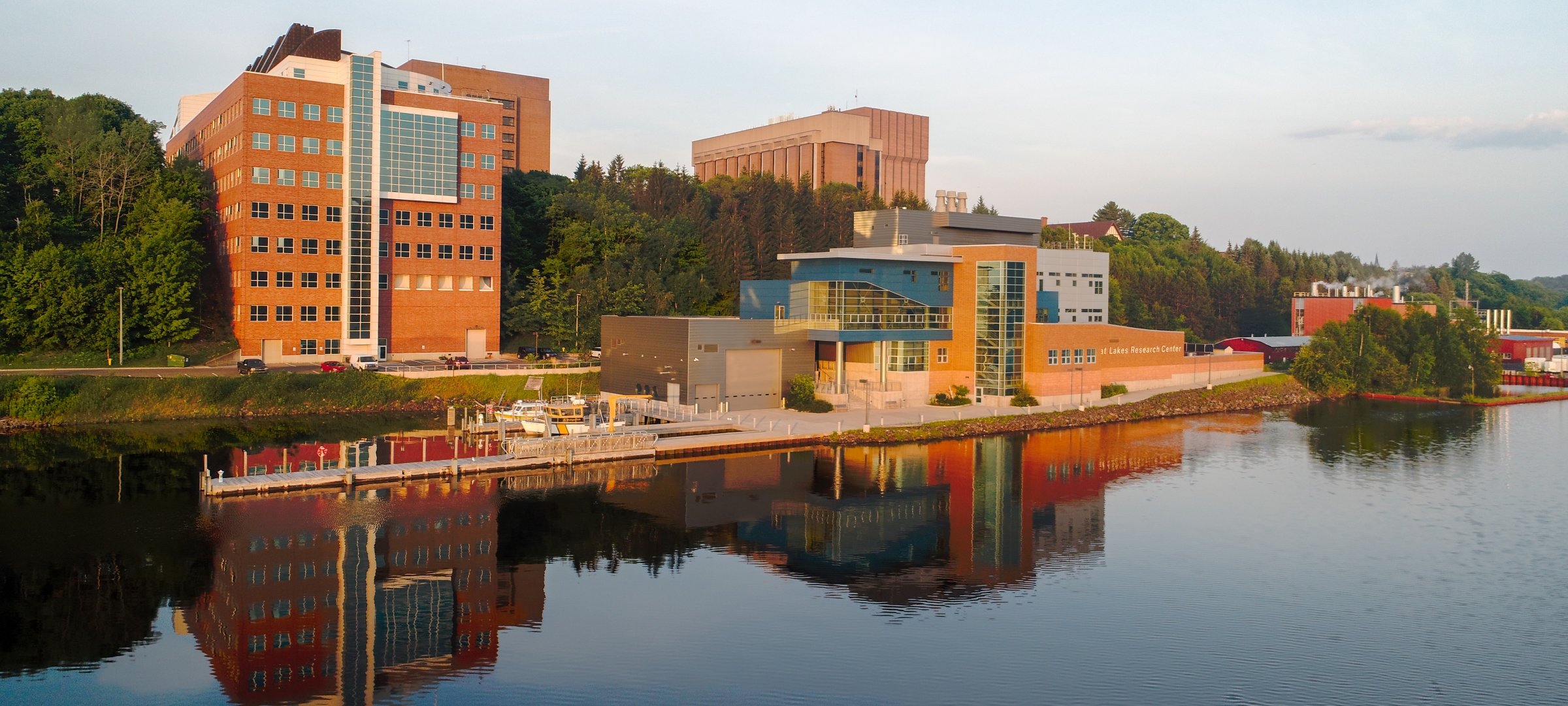 A view of campus from the Portage Canal in the early morning