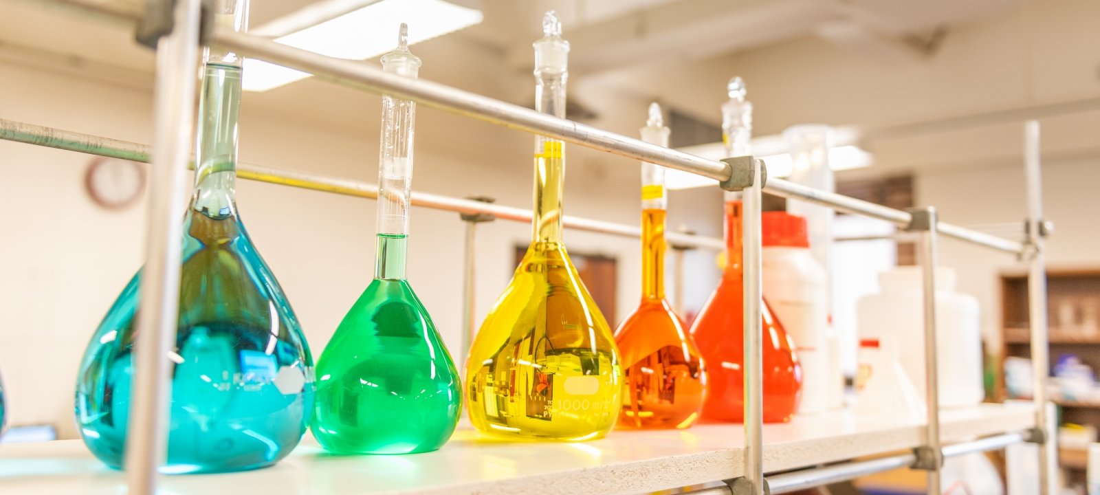 Colorful liquids in lab flasks