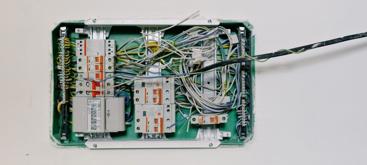 Inside view of a device with wires and circuits.