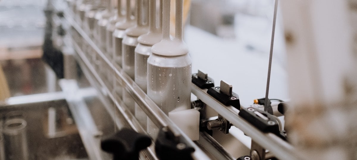 Inside view of a machine with cylinders in a track.