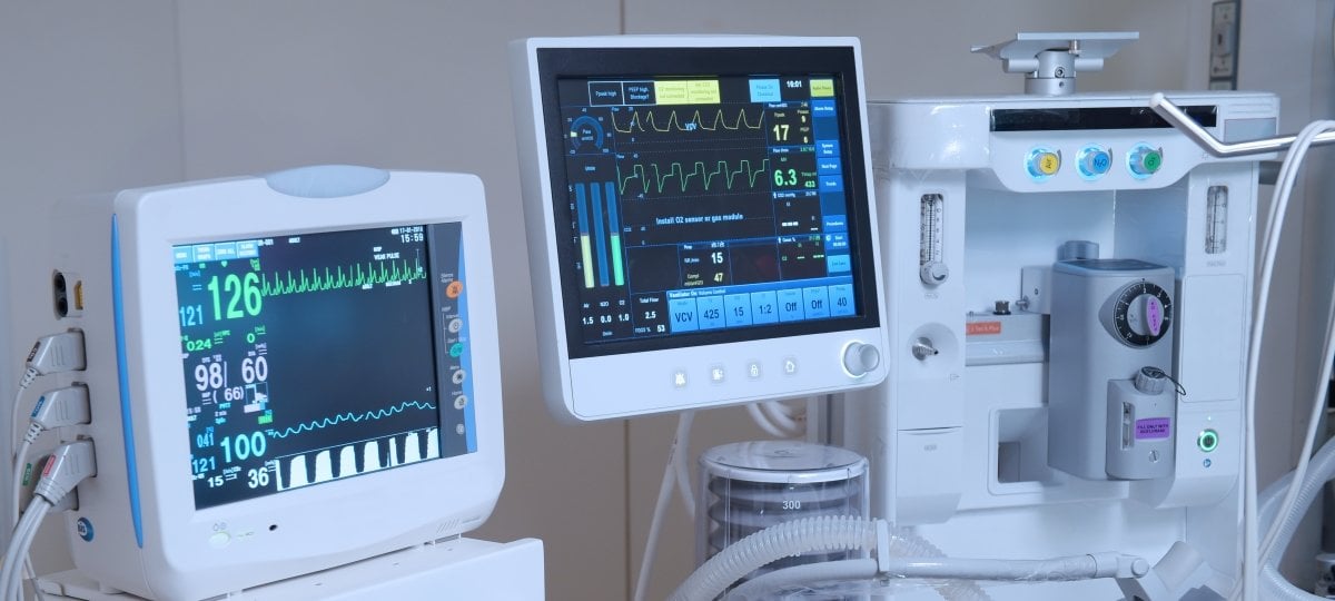 Medical equipment and devices in a modern operating room.