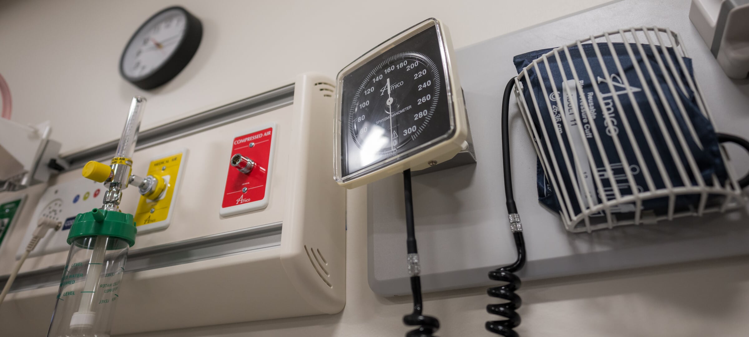Medical equipment and devices in a modern patient visit room.