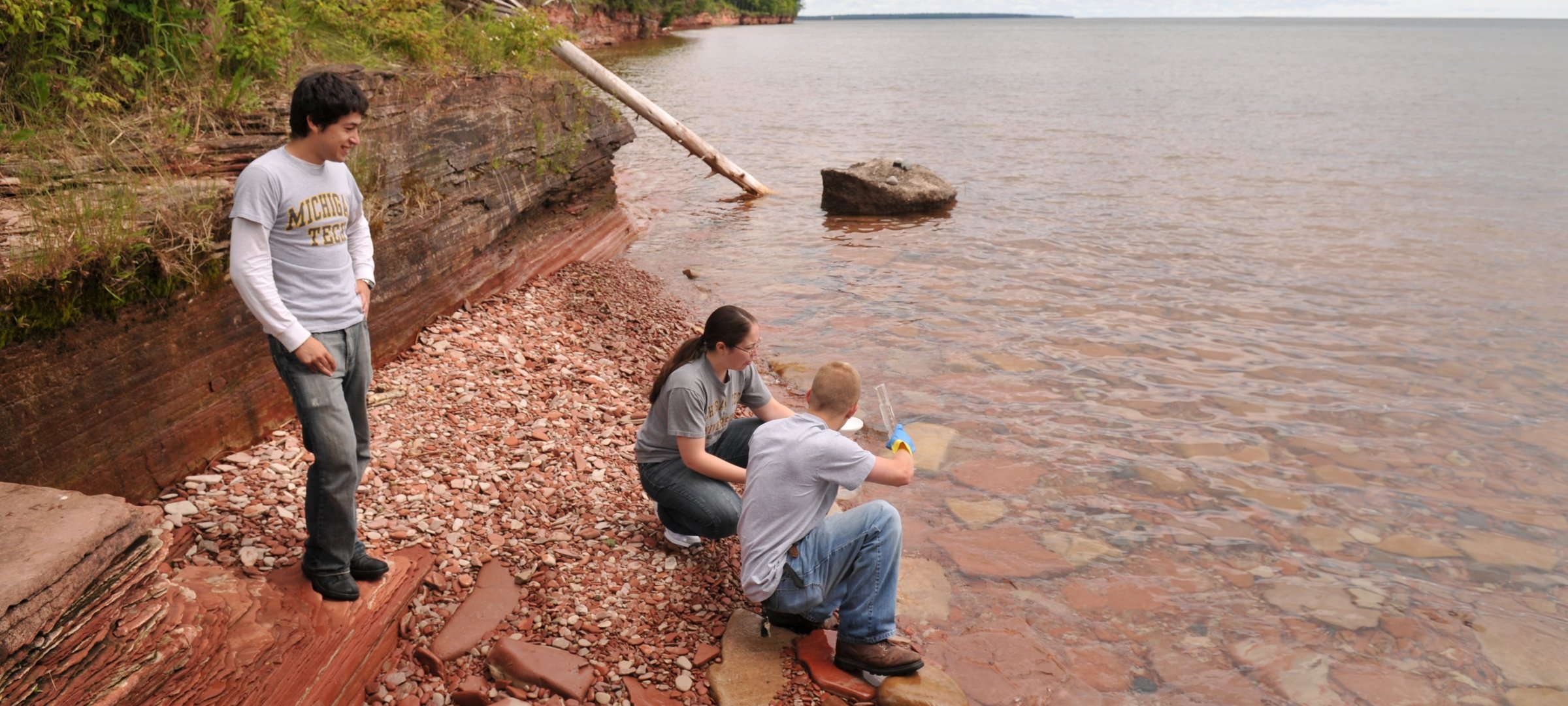 Students collecting water samples