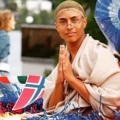 International Student during Parade of Nations clasping hands in prayer