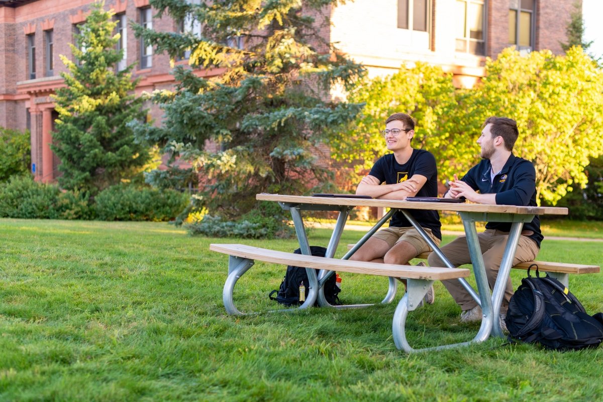 Two Business students on Michigan Tech's Campus