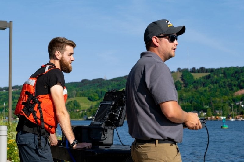 Erik Kocher and Clayton Spevak operating the Autonomous Wave Runner.